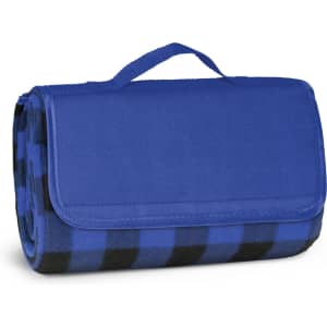 A blue and black checkered picnic blanket, neatly folded with a carry handle. Branding visible on the exterior.