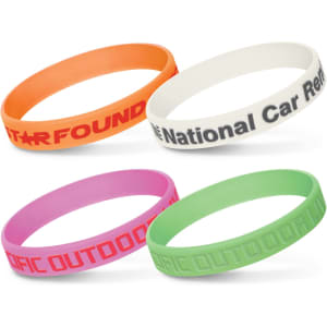 A set of four silicone wristbands in orange, white, pink, and green, featuring various logos and text.