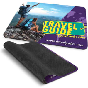 A colourful mouse mat featuring a scenic image of hikers, with a textured black underside and a logo.