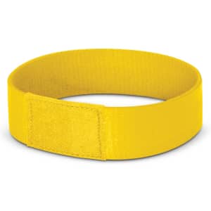 A bright yellow Dazzler Wrist Band made for events and exhibitions, featuring a secure fastening mechanism.