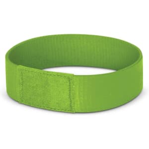 A bright green Dazzler Wrist Band made of durable material, featuring a secure hook-and-loop fastener.