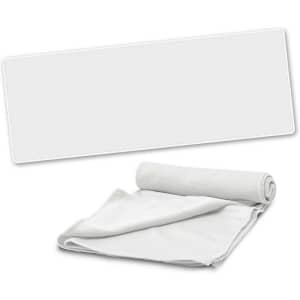 A cooling towel rolled up with a flat towel displayed behind it, both in a light color.
