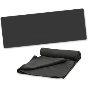 A cooling towel rolled and partially unrolled, presented in a sleek, dark design.