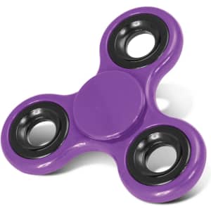 A fidget spinner in vibrant purple with black bearings.