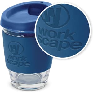A drink bottle in blue with a silicone sleeve and lid, featuring a logo on the sleeve. The bottle is glass.