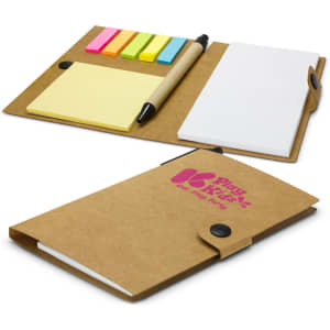 A kraft notebook with a pen, sticky notes in pink, yellow, and blue, and a logo on the cover.
