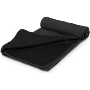 A black Yeti Premium Cooling Towel rolled up, featuring a textured surface and a smooth side, with a branded design.