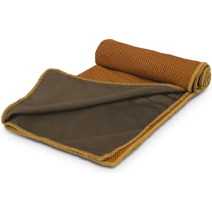 A rolled Yeti premium cooling towel in shades of brown and gold, featuring a mesh design. It has a logo on one side.