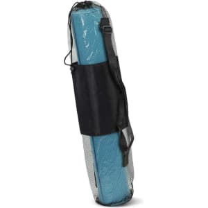 A Zen Yoga Mat rolled up and secured in a black mesh carrying bag with a shoulder strap.