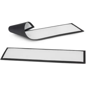 A black bar runner with a textured surface, featuring two mats, one rolled and one flat.