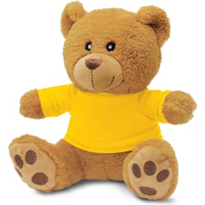 A brown teddy bear plush toy with a yellow shirt and paw prints on its feet. It has a friendly expression and rounded ears.