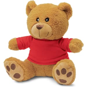 A plush teddy bear in a red shirt with brown paws and a friendly face, featuring a small logo on the shirt.