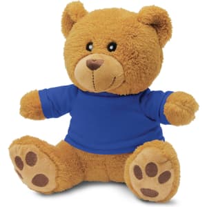 A plush teddy bear in brown with a blue shirt, featuring soft texture and paw details. It has a branded logo.
