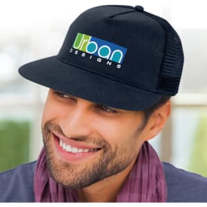 A black trucker cap with a mesh back and a logo on the front, worn by a smiling man.