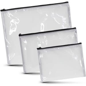 A set of three transparent cosmetic bags in varying sizes, each with a black zipper.