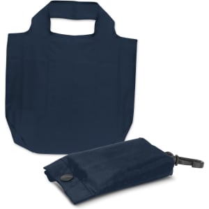 A navy foldaway reusable grocery bag alongside its compact pouch. The bag features a logo on the side.