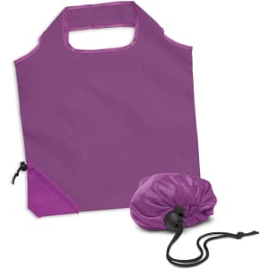 A purple foldable reusable grocery bag, packaged in a matching pouch for easy storage.