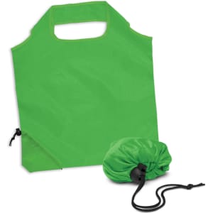 A green reusable grocery bag folded into a compact pouch, featuring a drawstring closure and a simple handle.