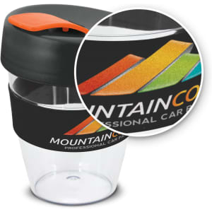 A drink bottle featuring a clear body, black lid, and vibrant orange highlight, with a logo on the sleeve.