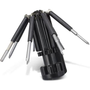 A black multi-tool featuring multiple screwdriver heads folding out from a central handle, with a compact design.