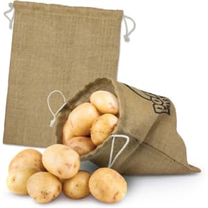A large jute produce bag in natural colour, filled with potatoes, displayed alongside an empty bag.