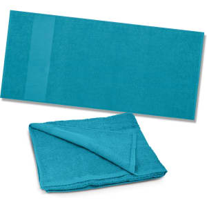 A turquoise beach towel displayed flat alongside a folded version, featuring a textured finish and a branding logo.
