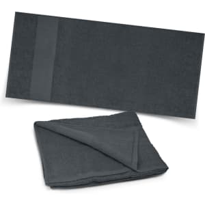A Dune Beach Towel in a deep gray color, featuring a folded version and a flat view showcasing its soft texture.