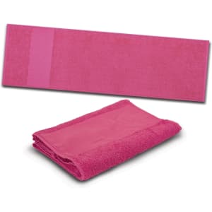 A pink Enduro Sports Towel laid flat and folded, featuring a textured surface and a logo.