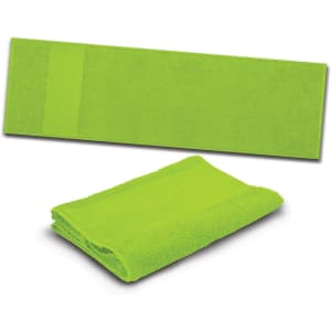 A vibrant green towel, both folded and laid out flat, featuring a subtle branding logo.