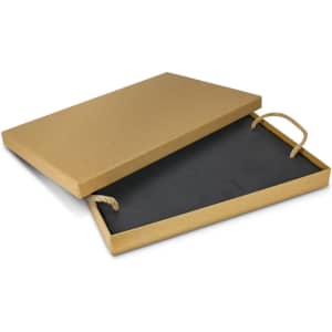 A slate serving board in a brown box with handles, featuring a black interior. The box is open, displaying the board inside.