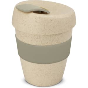 A drink bottle featuring a speckled natural finish with a green silicone band and a lid. It has a compact design.