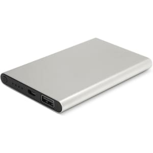 A silver power bank with a sleek design, featuring USB ports and an indicator light.