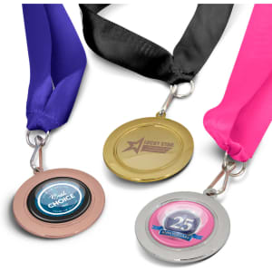 Three podium medals in gold, silver, and bronze with coloured ribbons: black, pink, and purple. Each medal features a logo.