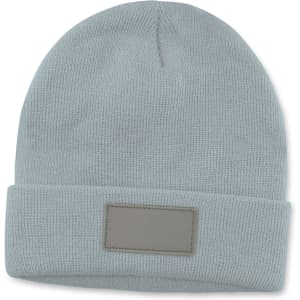 A light blue beanie featuring a fold-over cuff and a blank patch for customization.
