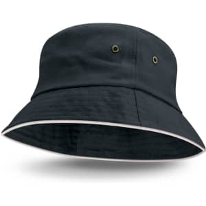 A white bucket hat with a contrasting sandwich trim, featuring ventilation eyelets and a rounded brim.
