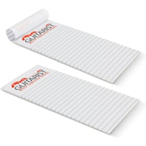 A vertical notepad featuring lined pages with a white background and a logo at the top.