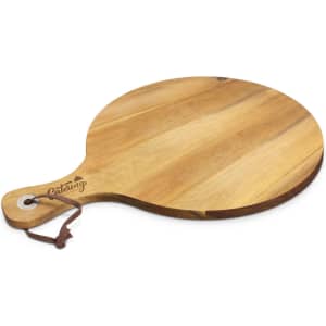 A round wooden serving board with a handle, featuring a natural finish and a leather strap.