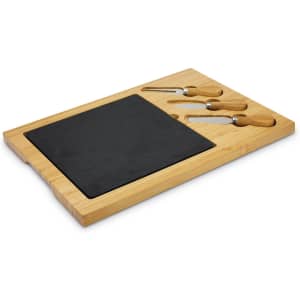 A slate cheese board with a bamboo base and three wooden-handled cheese knives. Features a smooth black surface.
