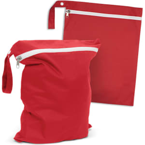 A red Brighton Wet Bag featuring a zipper closure and a convenient handle, with another flat bag in the background.