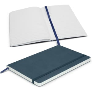 A dark teal notebook with lined pages, featuring a ribbon bookmark and a contrasting cream base. It has a logo on the cover.