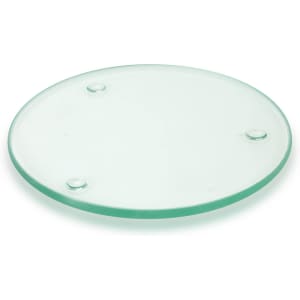 A round glass coaster with a frosted finish and three small rubber feet on the underside.