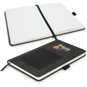 A green Princeton Notebook with a textured cover, featuring a logo and open pages with lined paper.