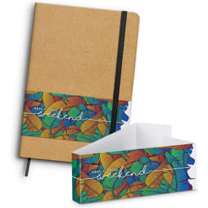 A Somerset cork notebook in a natural colour, featuring a vibrant, illustrated band with a floral design and branding.