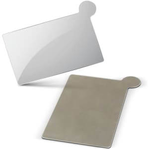 A mirror featuring a sleek silver finish, with a rounded top corner and a smooth reflective surface.