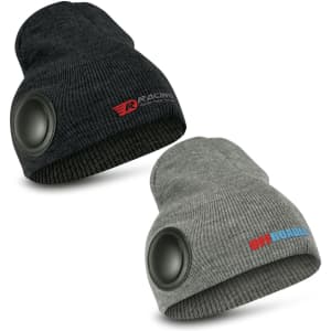 A black and grey beanie featuring Bluetooth speakers, with logos on the side. Soft knit material with a snug fit.