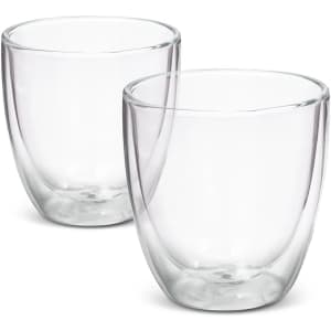 A double wall glass set in clear glass, featuring two glasses with a rounded design.