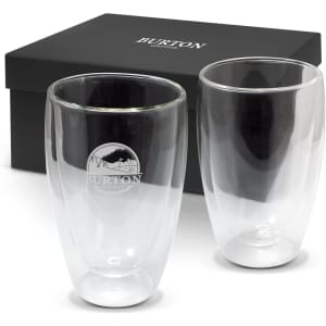 A double wall glass set featuring clear glass tumblers, packaged in a black box with a logo.