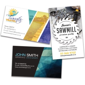 A collection of full-colour business cards featuring various designs, including logos and vibrant graphics.