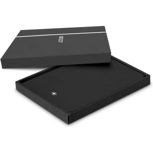 A black A5 notebook, presented in an elegant box, features a logo and a sleek design suitable for office use.