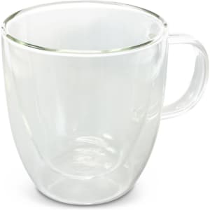 A double wall glass cup in clear glass with a handle, designed for reusable coffee or hot beverages.